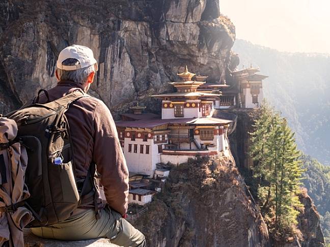 Best places to visit bhutan taktsang monastery with trekker 600x450