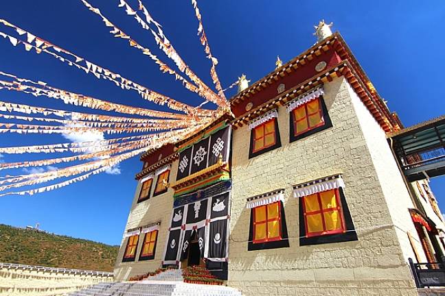 Meaning of prayer flags Ganden Monastery tibet 600x400