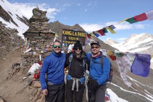 Harry and friends on top of the world at the Kang La Pass