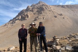 Guide and group in front of Mount Kizlarsivrisi