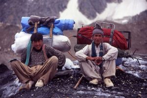 Porters resting en route to Concordia. Image by J Turner